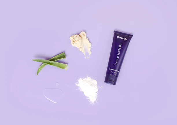 Elegant flat lay of Molecule brand moisturizers and creams on a clean white surface
