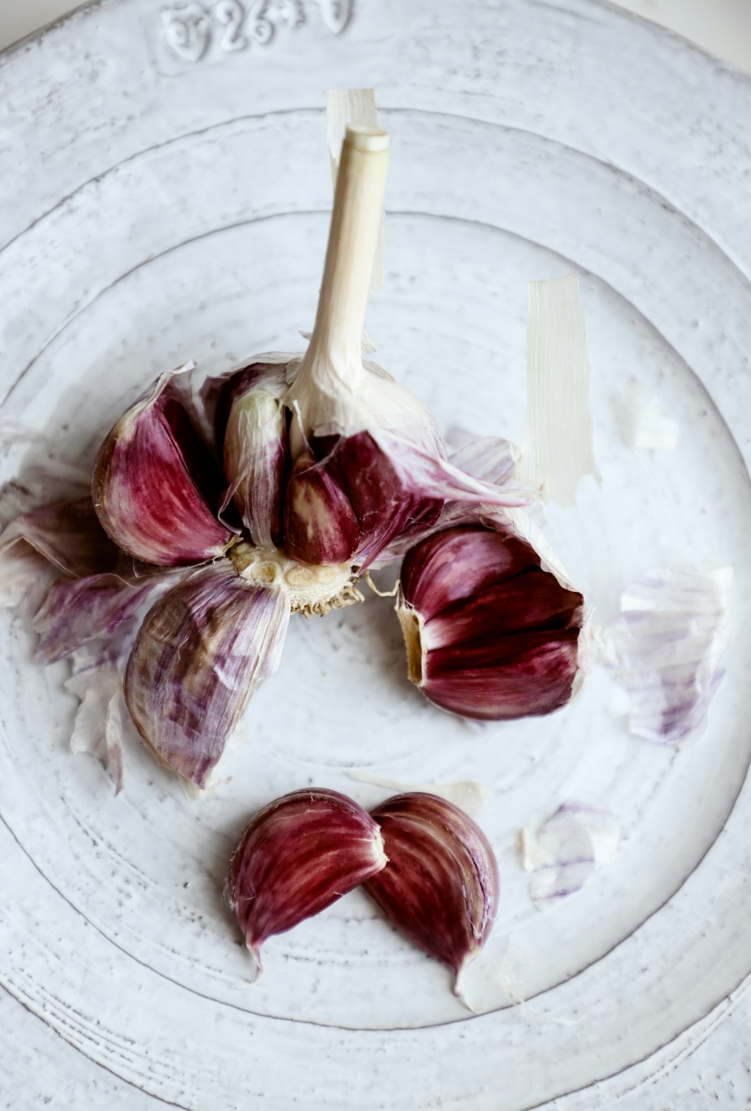 garlic on white plate