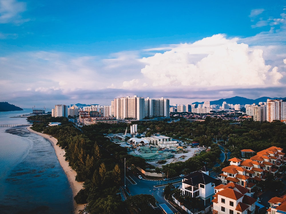 aerial photography of building beside body of water