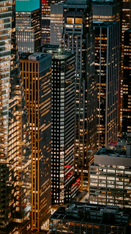 turned-on lights of high-rise building