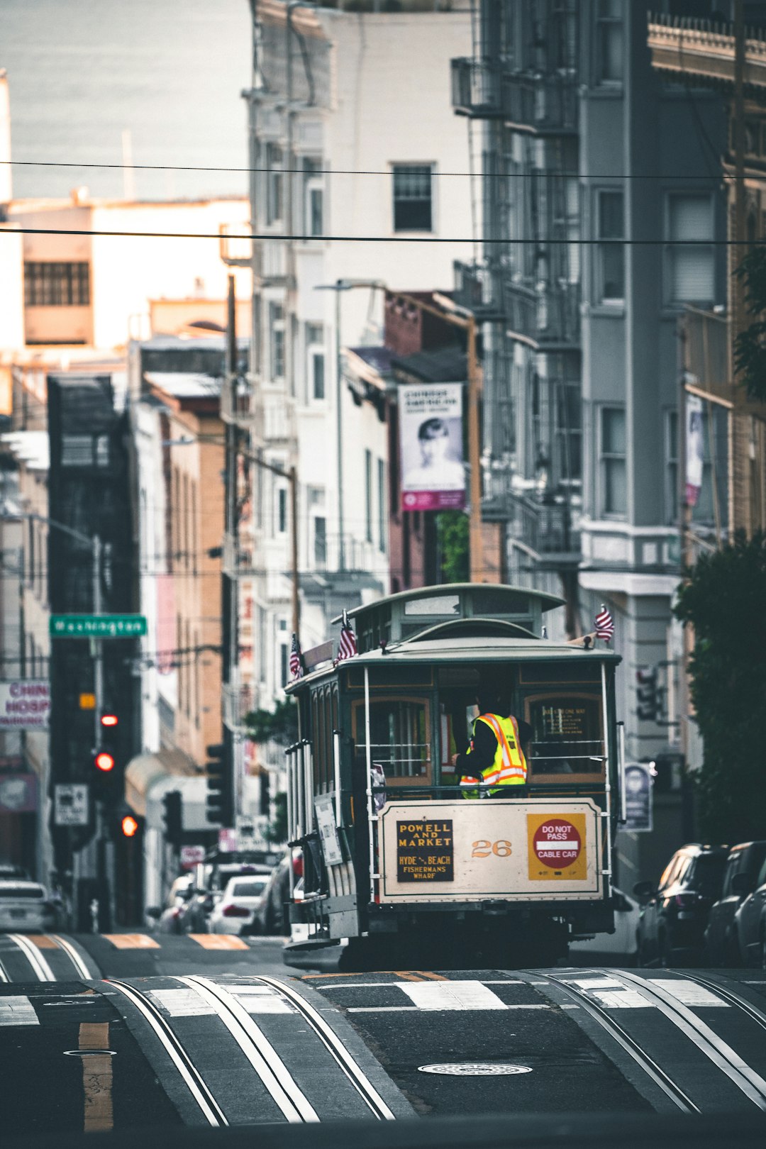 cable train on road near buildings during day