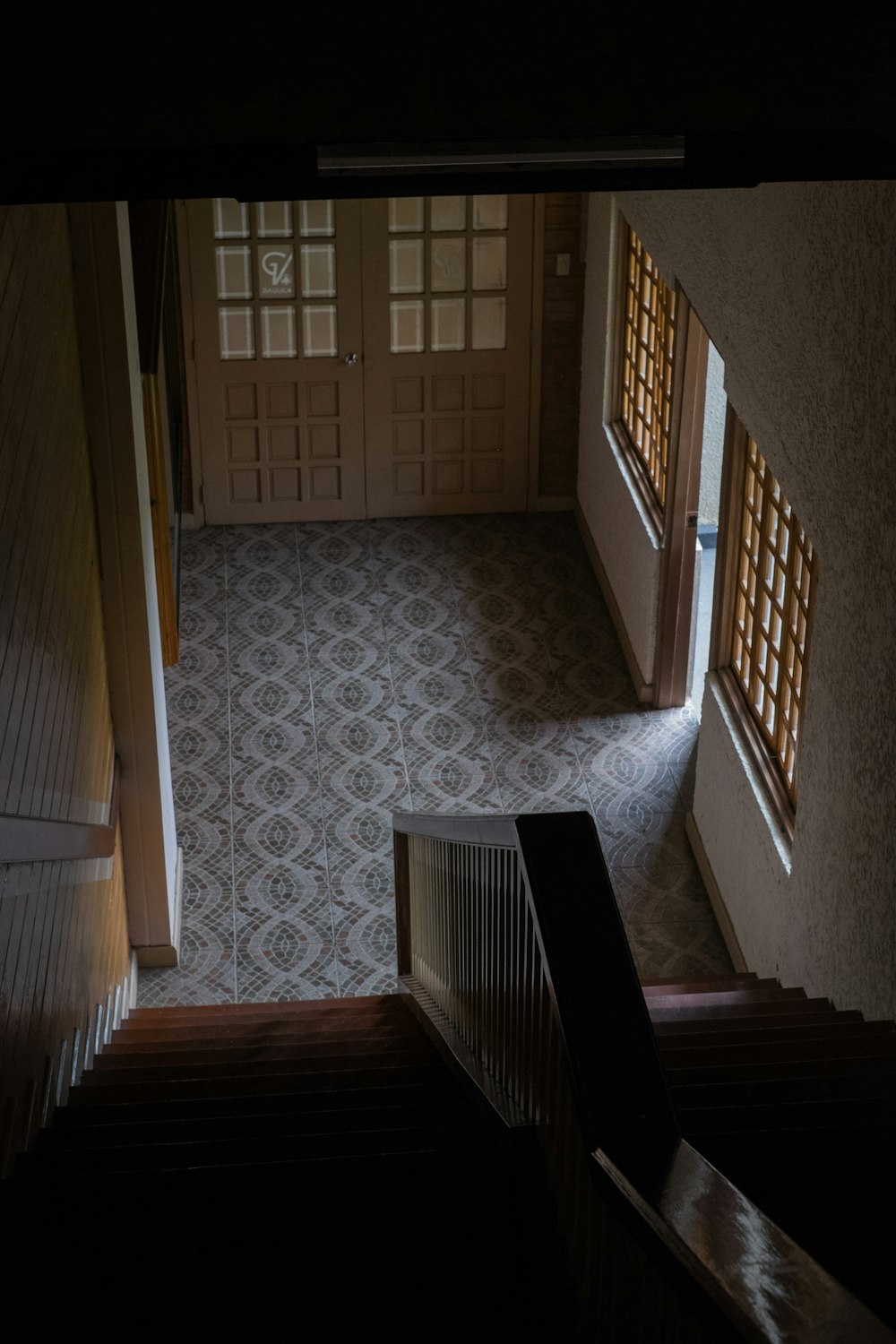 a view of a stairway from the top of a building