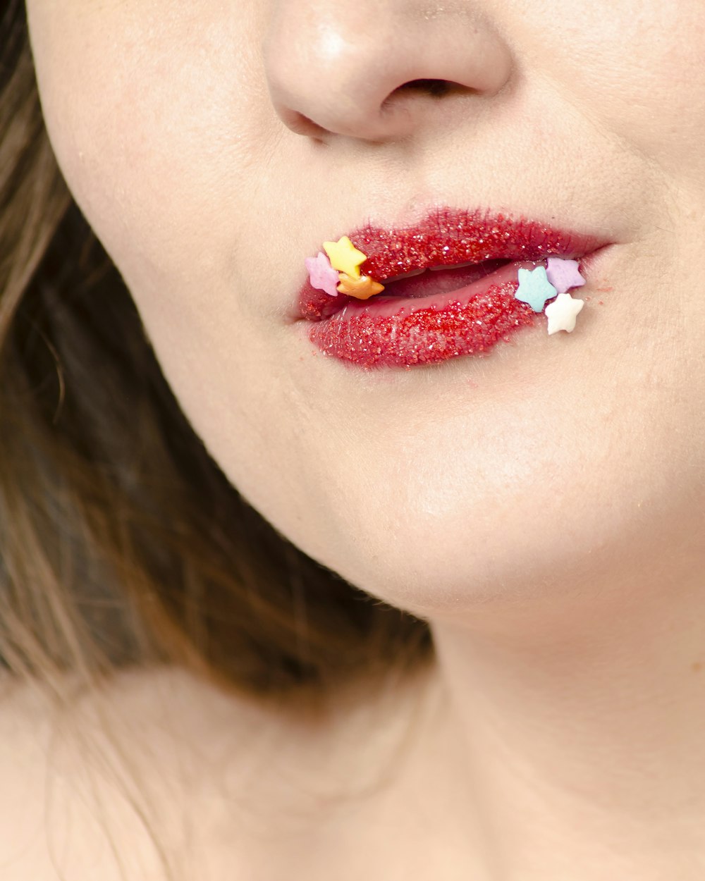 woman with red lipstick and stars