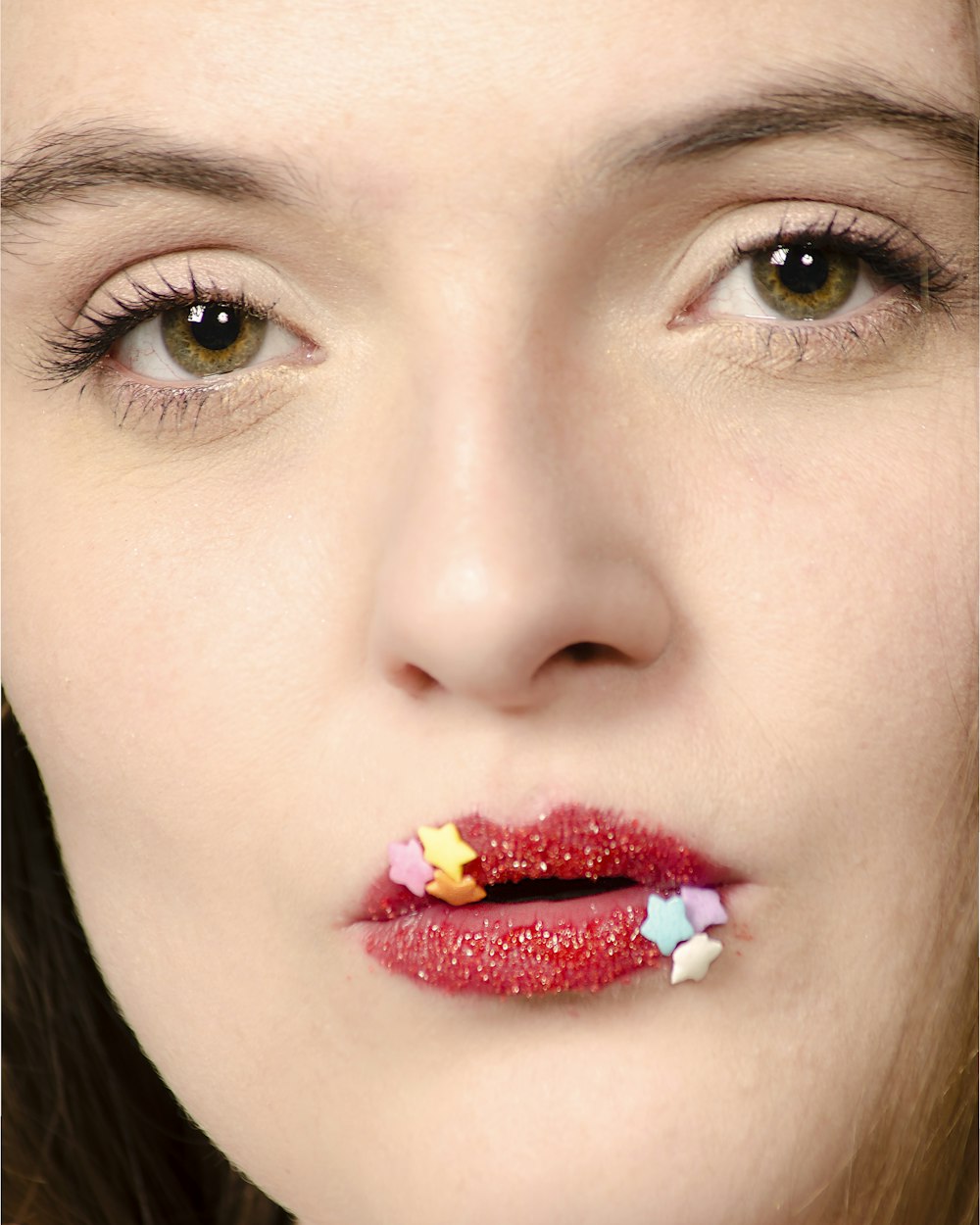 woman with stars on lips