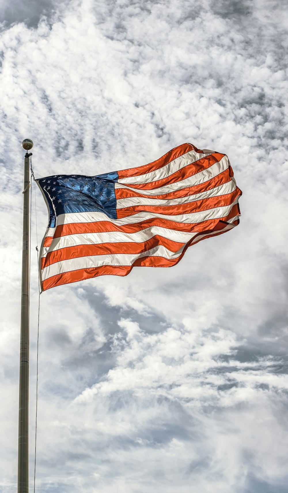 USA flag raises on the pole