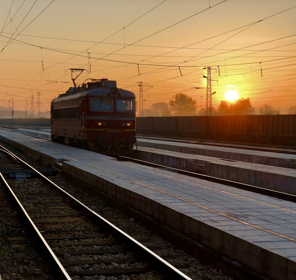 red cable train during golden hour