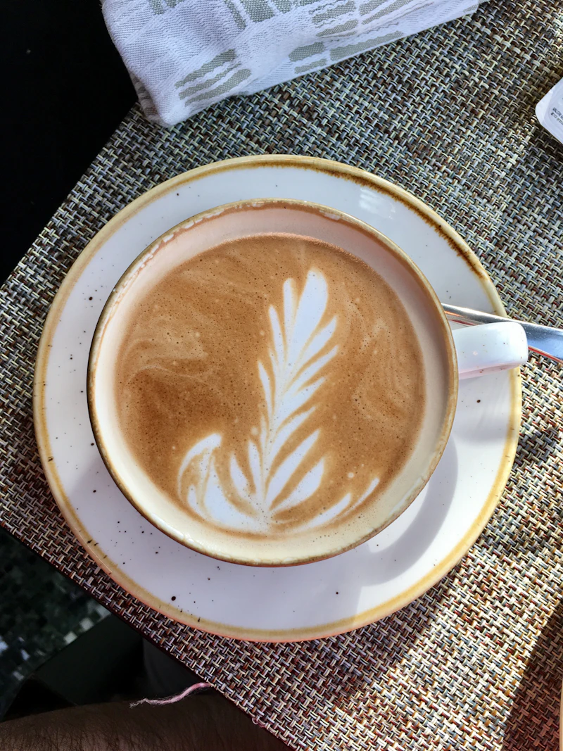 Latte art with a heart in a ceramic cup