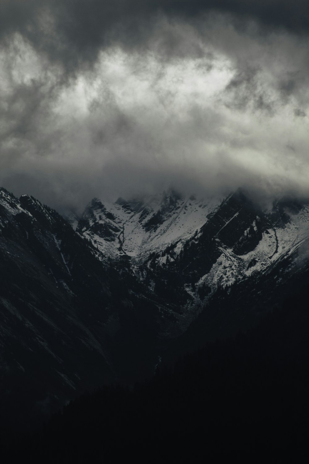 photo of foggy icy mountain top