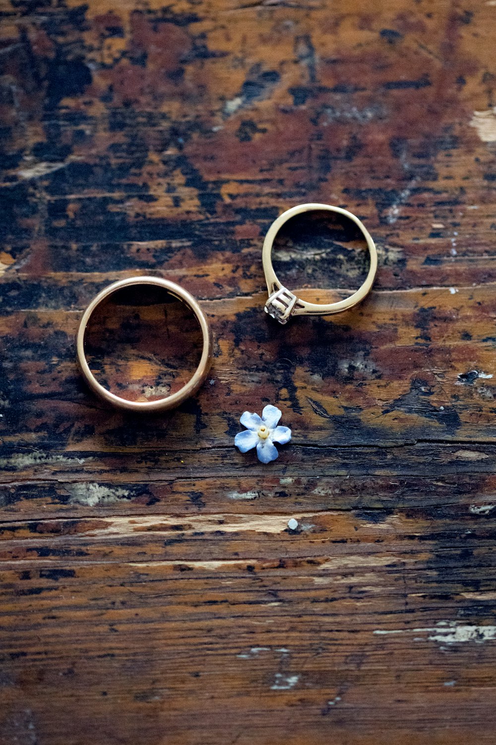 gold-colored bridal ring set