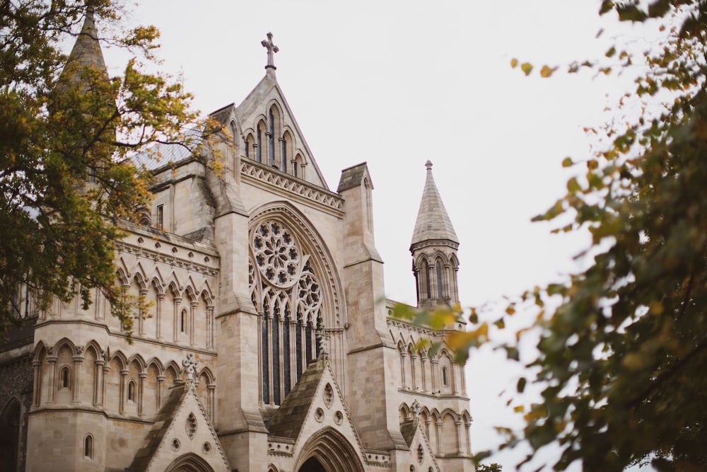 selective focus photography of white concrete church during daytime