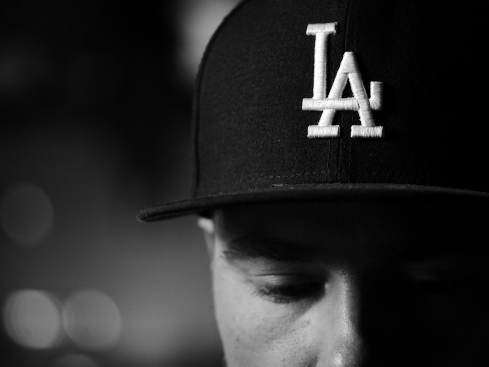 man wearing black fitted cap