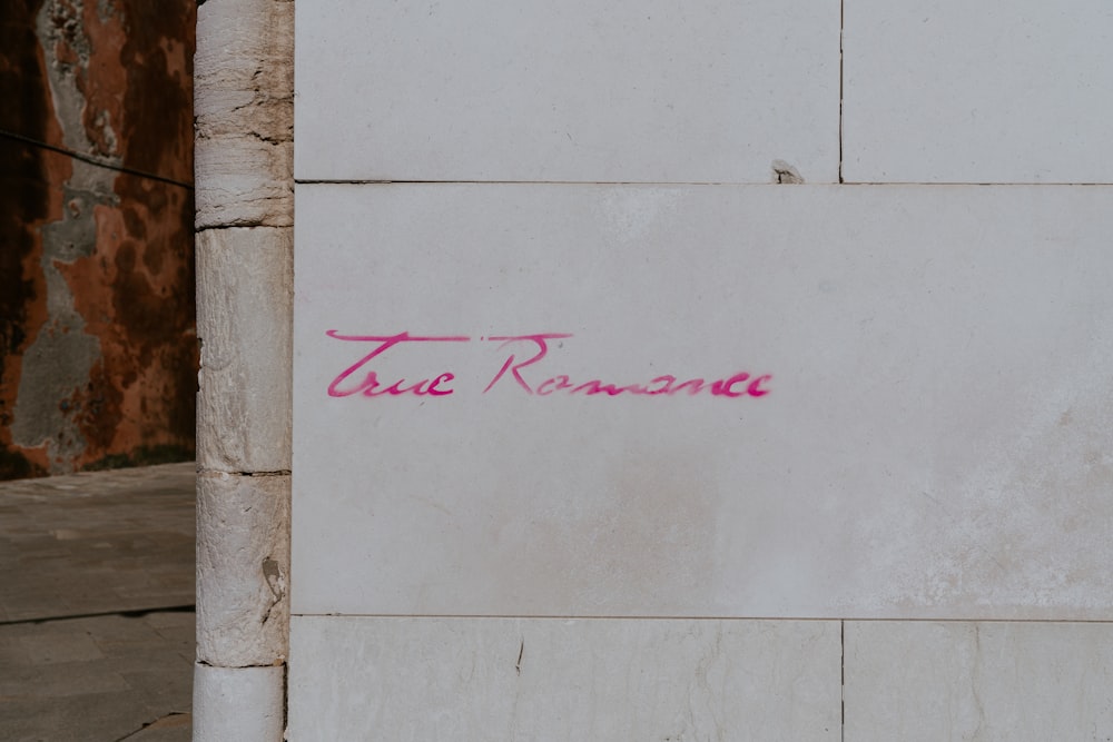 True Romance text on wall