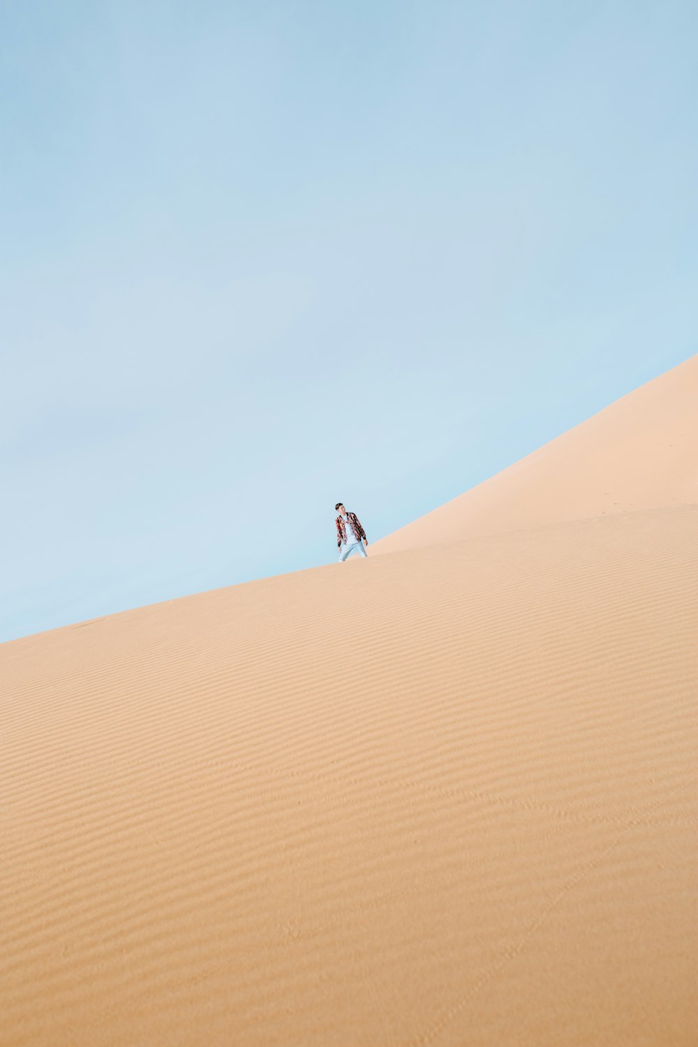 man standing on desert