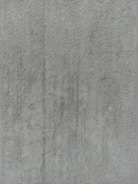 Close-up of polished concrete floor showing smooth texture and shine