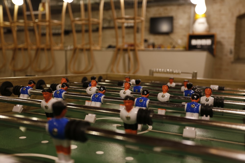 blue, white, and green foosball table