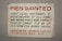 A vintage sign with bold red and black lettering on a white background. The text advertises job openings for first-class mechanics and helpers, with instructions to contact Charles Schmidt for an application. The bottom features the name of a shipbuilding and dry dock company located in Sturgeon Bay, Wisconsin.