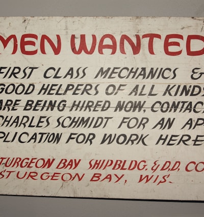 men wanted signage