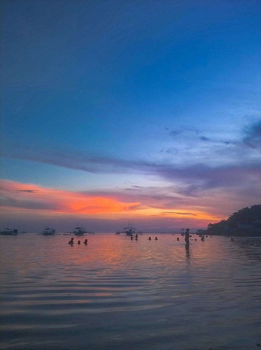 calm sea under blue sky