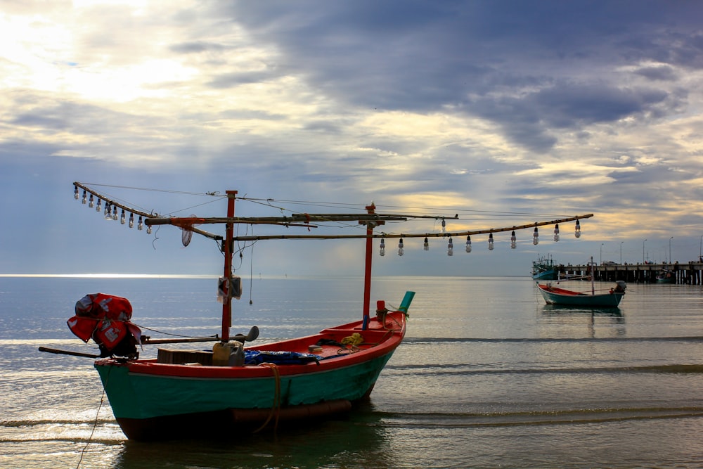 a boat sitting on top of a body of water