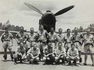 Vintage black-and-white photo of Brazilian soldiers in World War II uniform standing proudly in Fernandópolis.