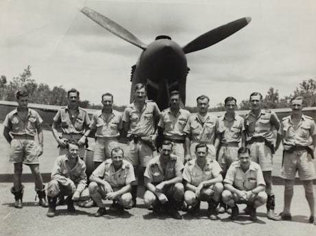 Vintage black-and-white photo of Brazilian soldiers in World War II uniform standing proudly in Fernandópolis.