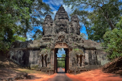 the entrance to an ancient temple in the jungle