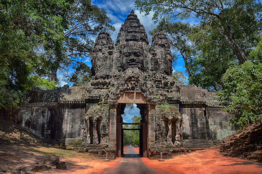 the entrance to an ancient temple in the jungle