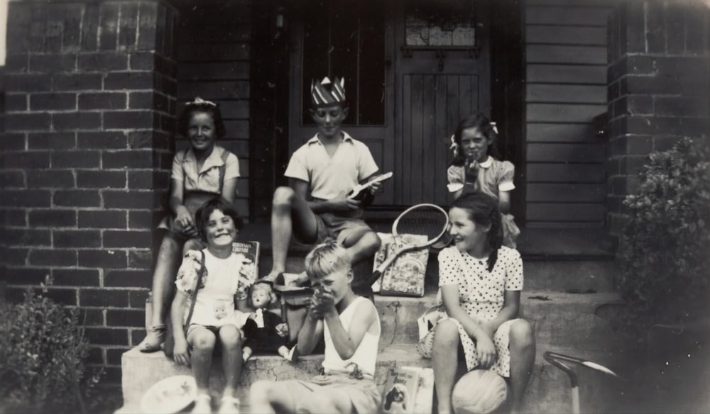 grayscale photo of six children