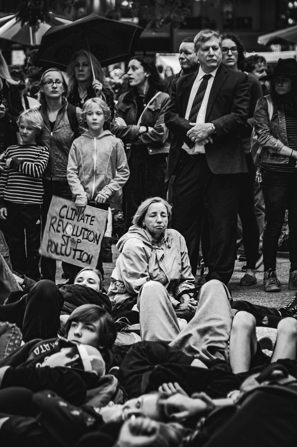 a black and white photo of a crowd of people