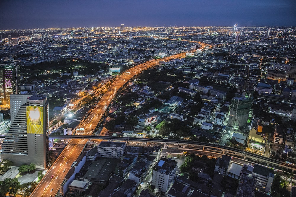 an aerial view of a city at night