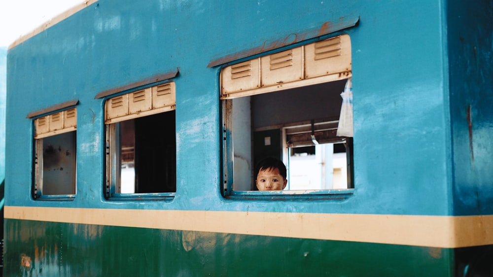 boy in window