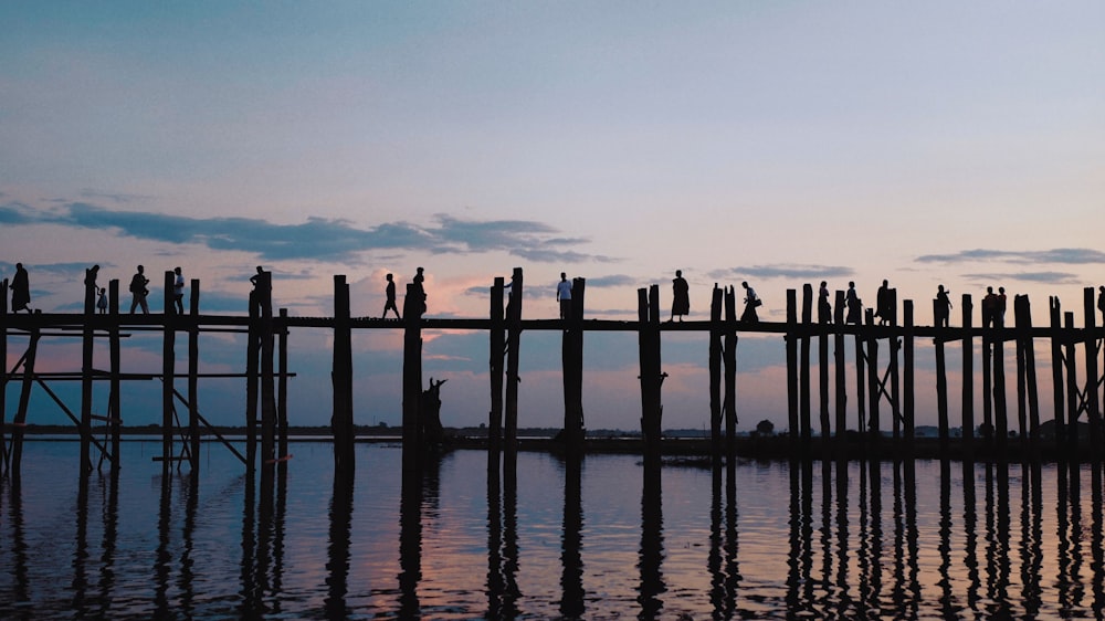 a long wooden bridge over a body of water