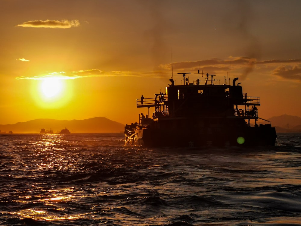 a large boat in the middle of a body of water