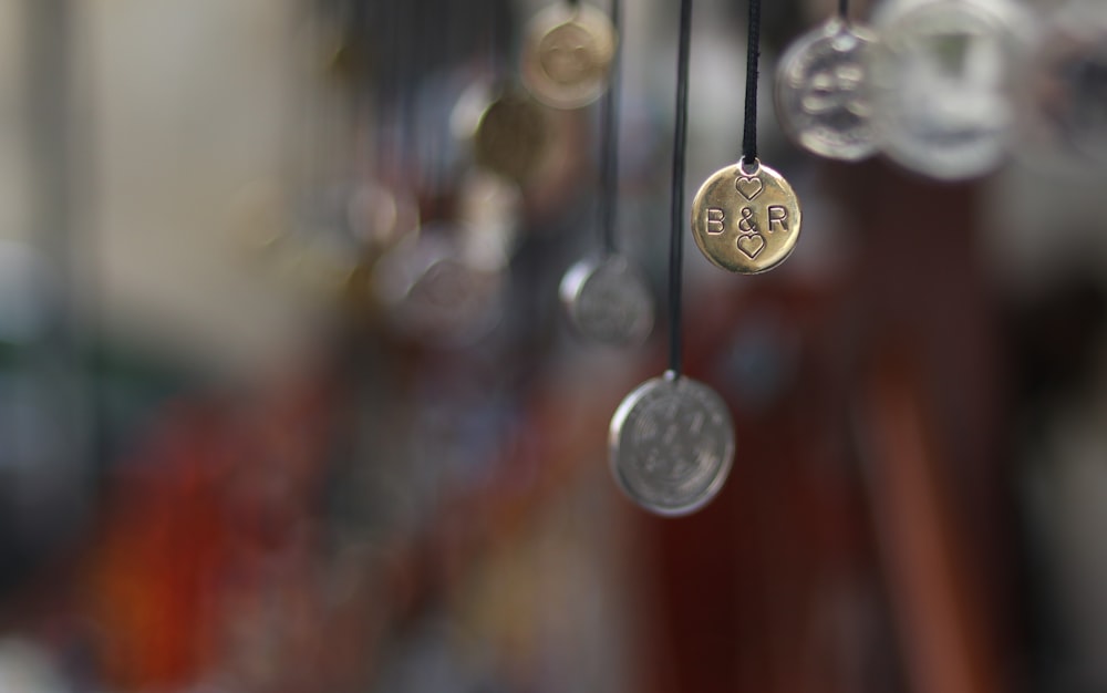 silver-colored pendants
