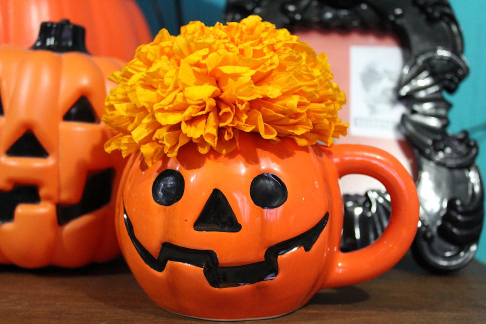 jack o lantern mug with flower