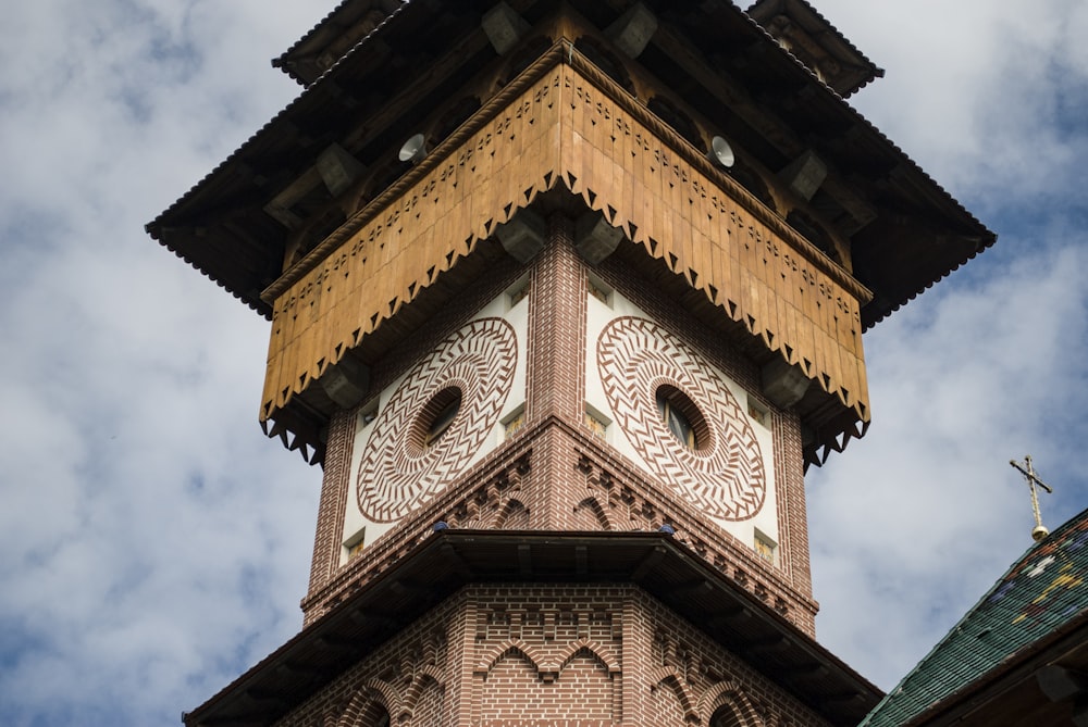 a tall clock tower with a sky background