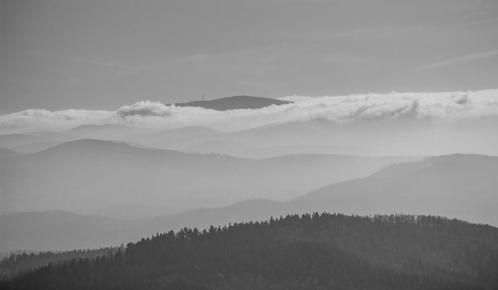 a black and white photo of a mountain range