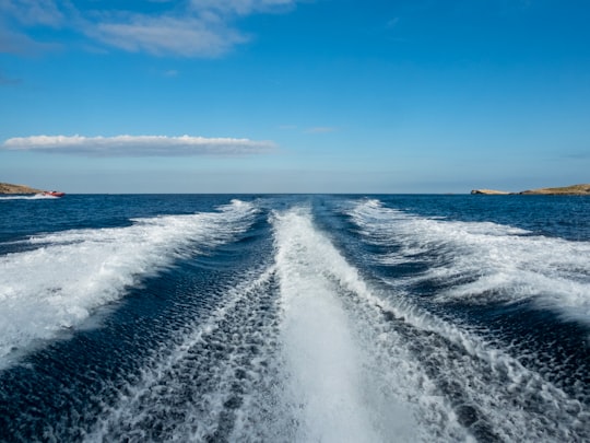 blue and white ocean water during daytime in Comino Malta