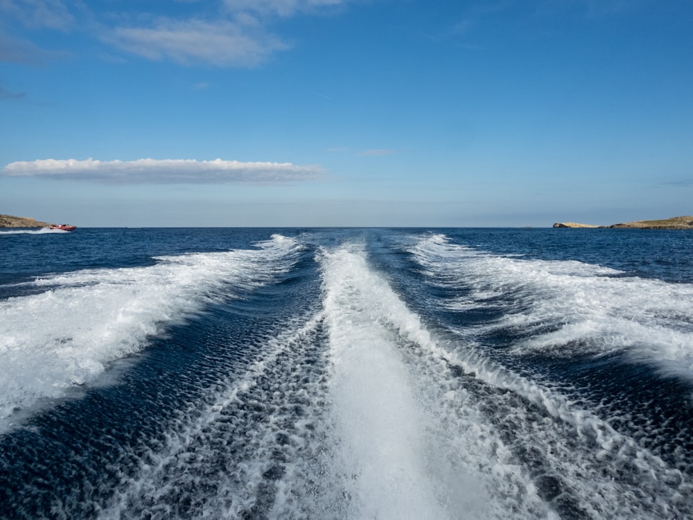 blue and white ocean water during daytime