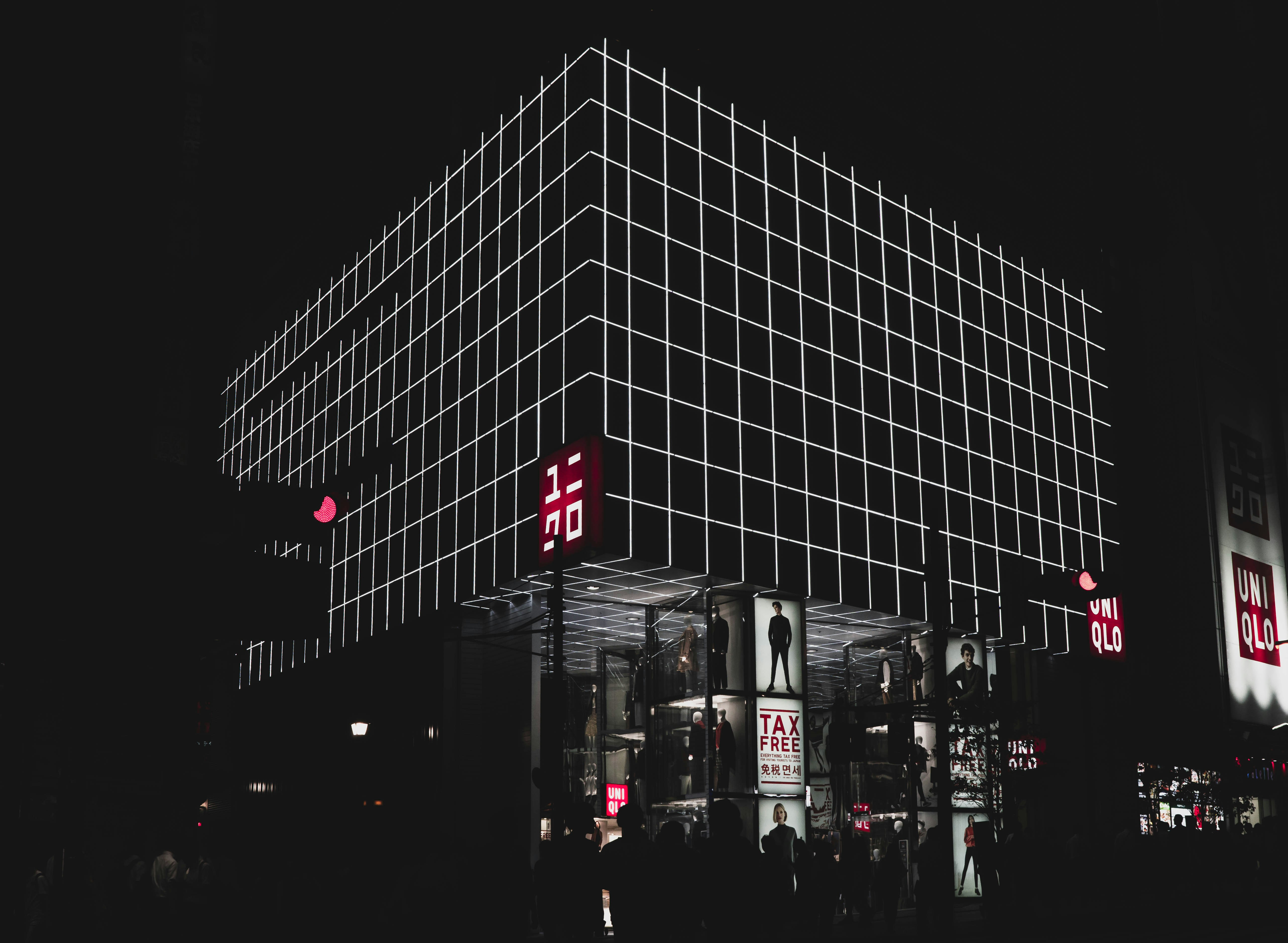 building with billboards at night