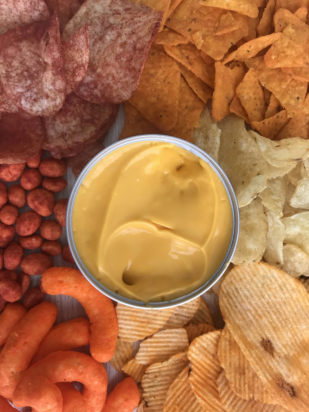 bowl of gravy beside crackers