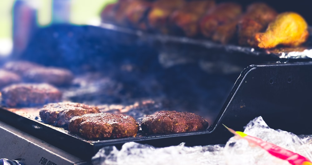 burger patties on grill