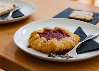 selective focus photo of pastry on white plate