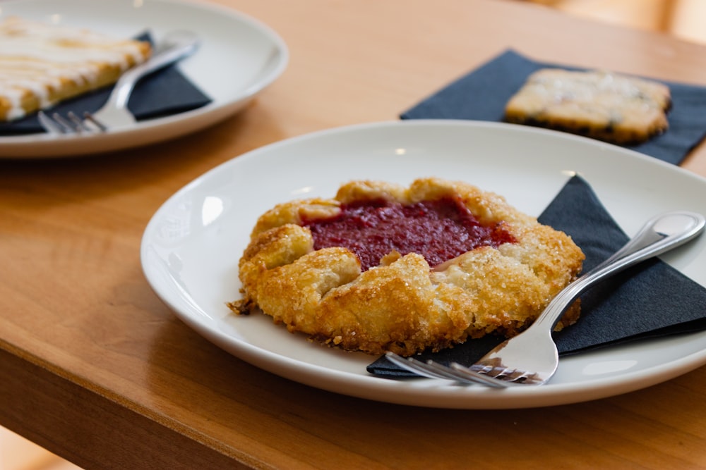 selective focus photo of pastry on white plate