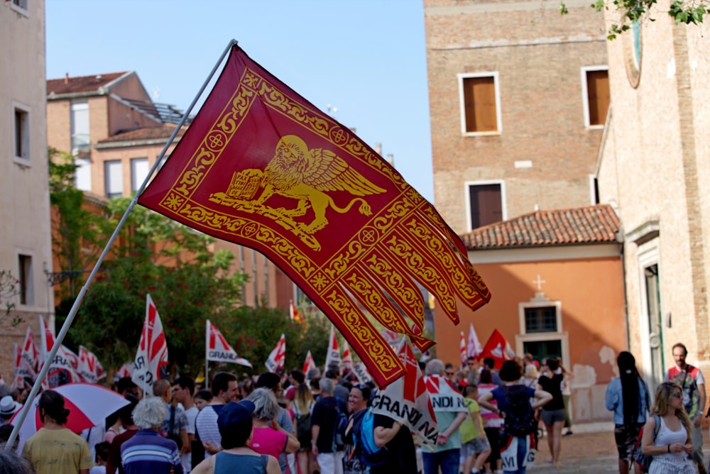 people holding banner in the street