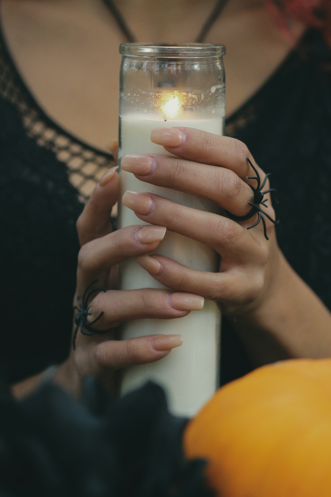 white and black pillar candle