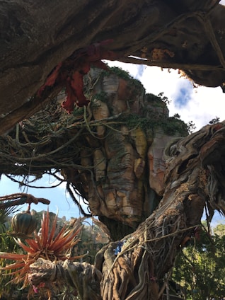 Screenshot of Zaetherfall gameplay showing a vivid fantasy landscape with characters in action.