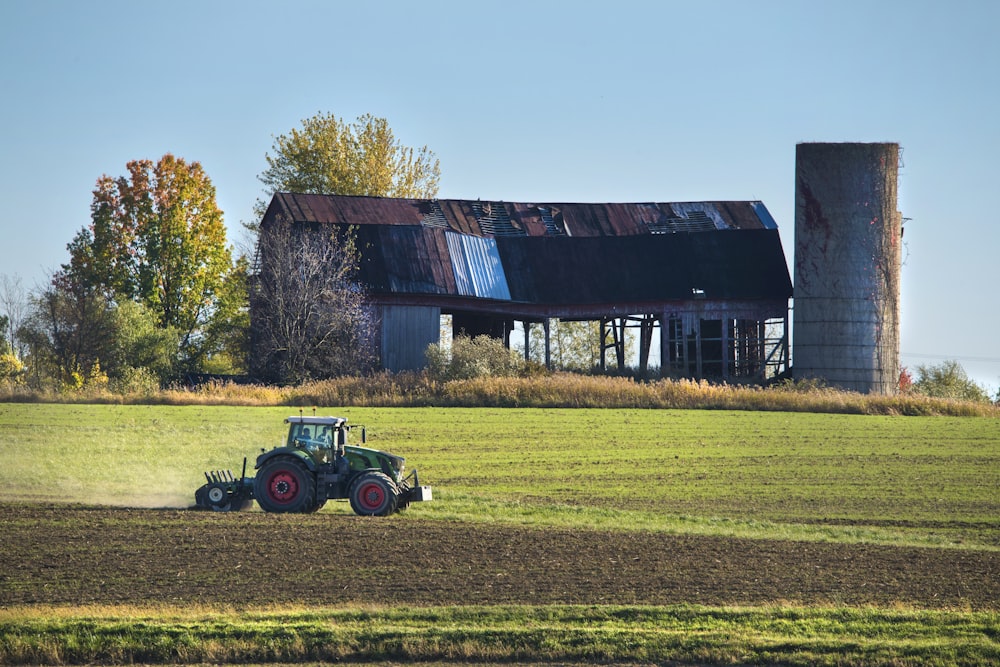 green and red farm tractor