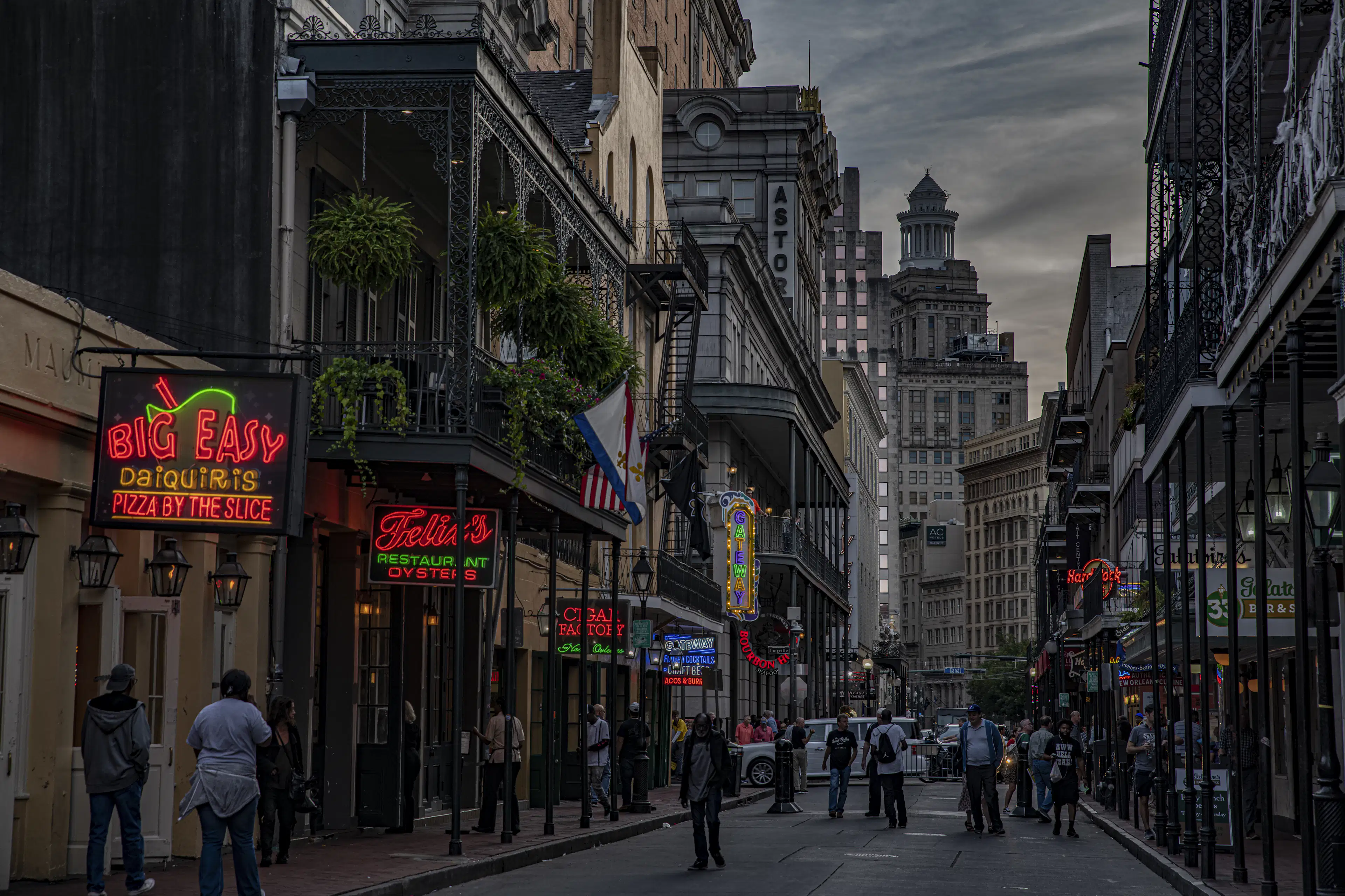 Historic French Quarter balconies and street life in New Orleans