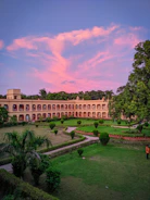 brown building under blue skies
